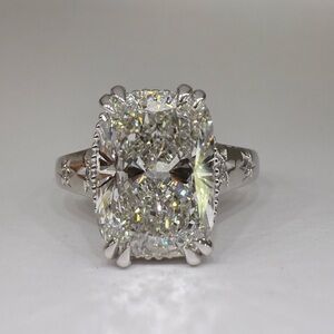 5.15 carat E VS1 elongated cushion diamond star band engagement ring